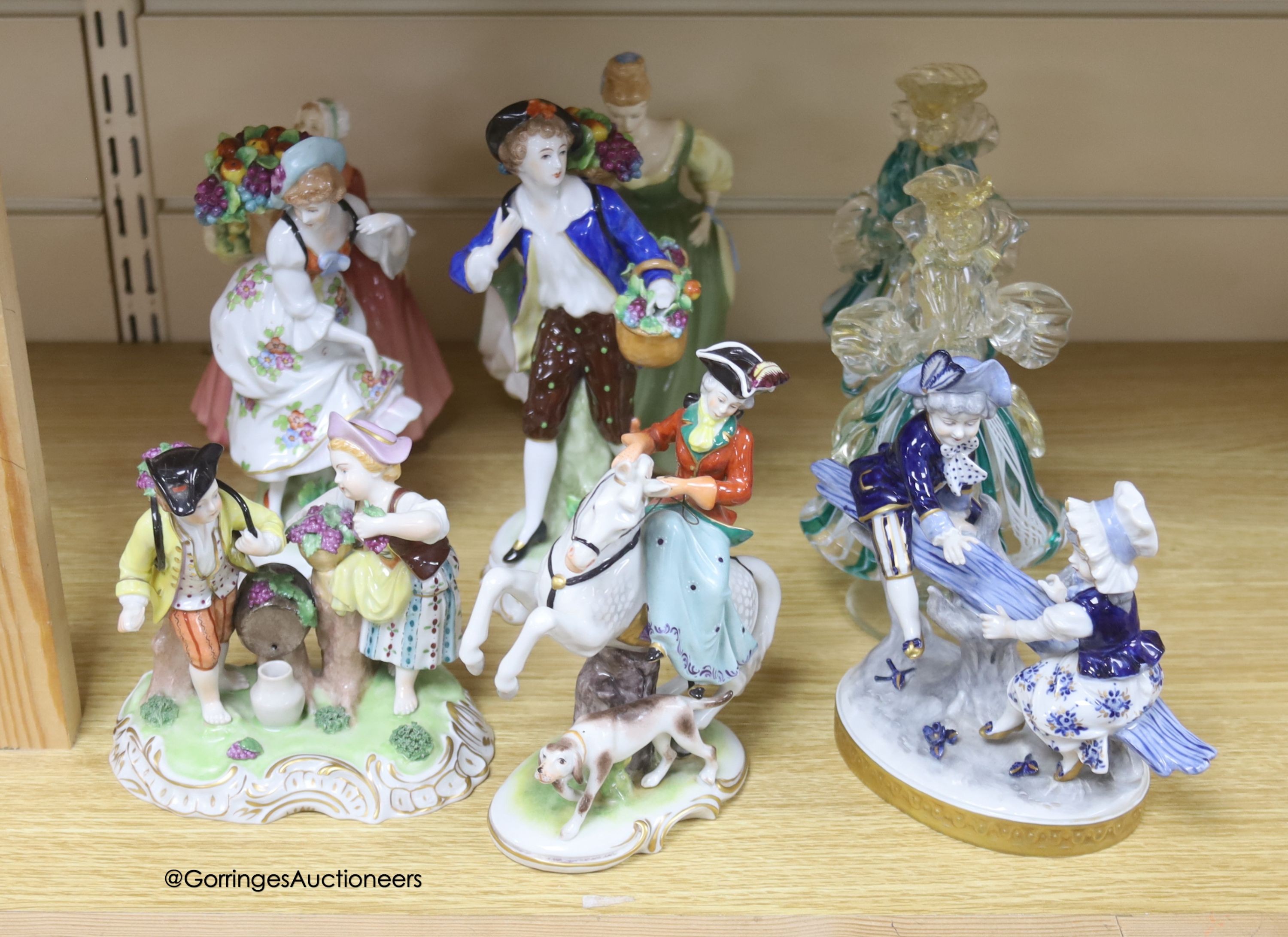 A collection of 20th century Sitzendorf, Dresden and Doulton porcelain figures, tallest 21cm and a pair of Murano glass figures